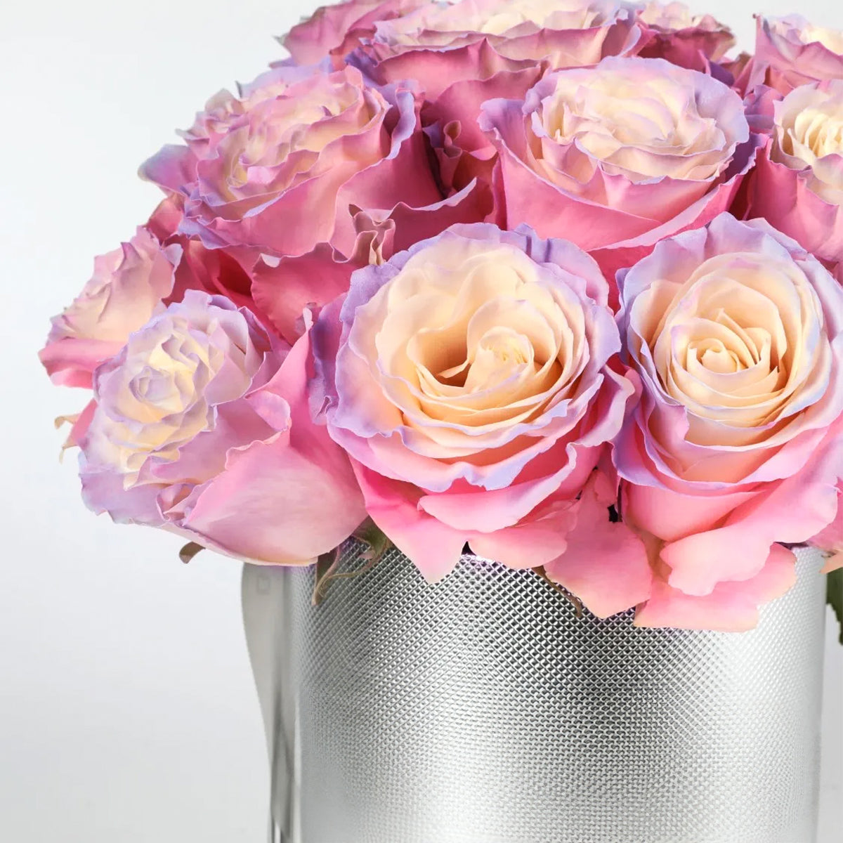 Whisper of Sunlight – Pastel Rainbow Roses in Silver Hug Bucket