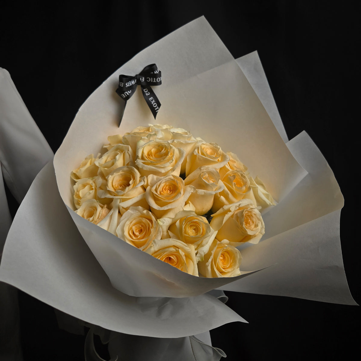 Timeless Elegance Bouquet – Cream Roses & White Wrapping with Black Ribbon