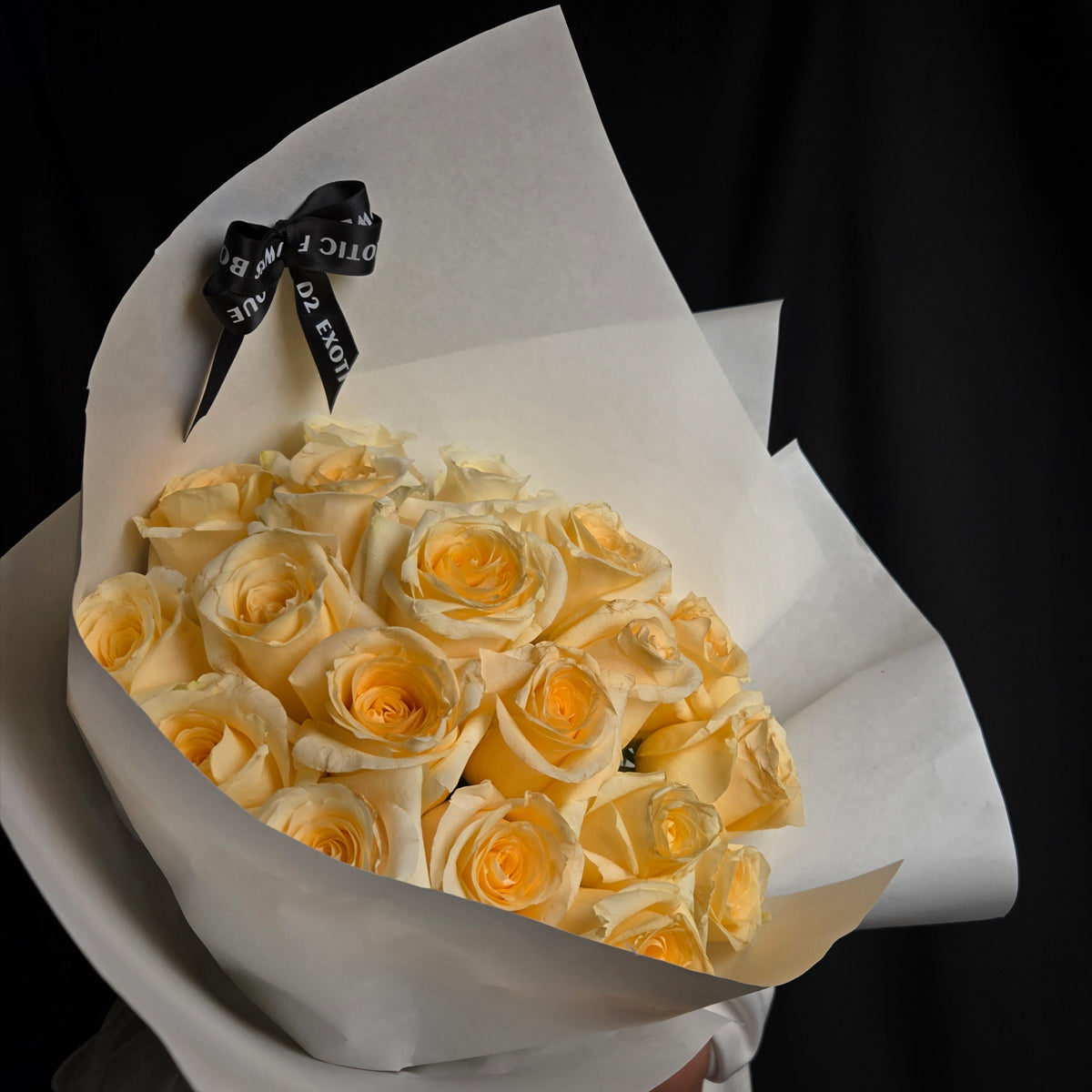 Timeless Elegance Bouquet – Cream Roses & White Wrapping with Black Ribbon
