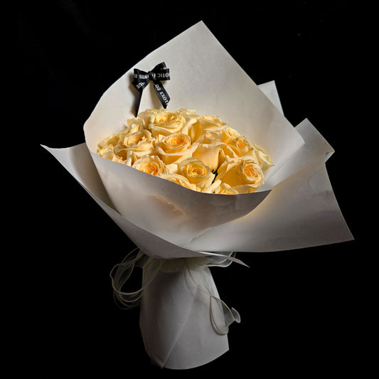 Timeless Elegance Bouquet – Cream Roses & White Wrapping with Black Ribbon